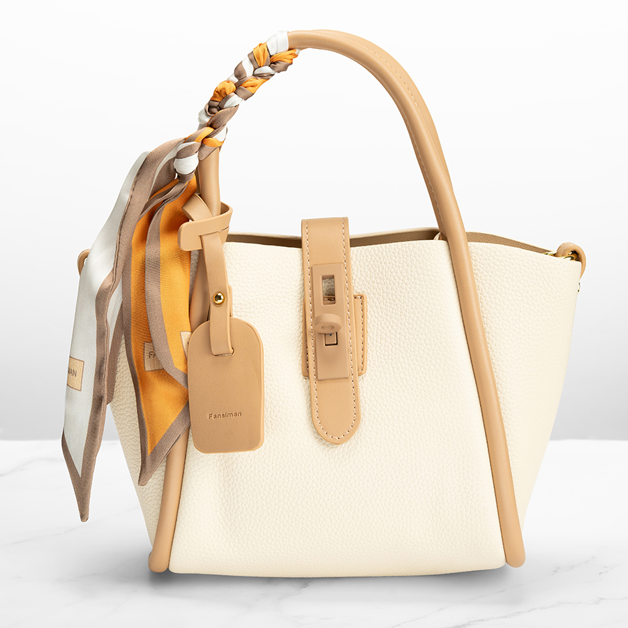 Casual bag beige color with zipper and lock + ribbon in leather