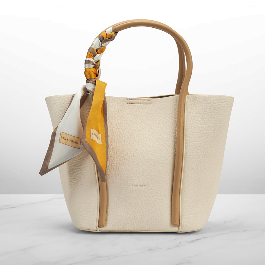 Bucket bag light and earthy beige color in leather with ribbon