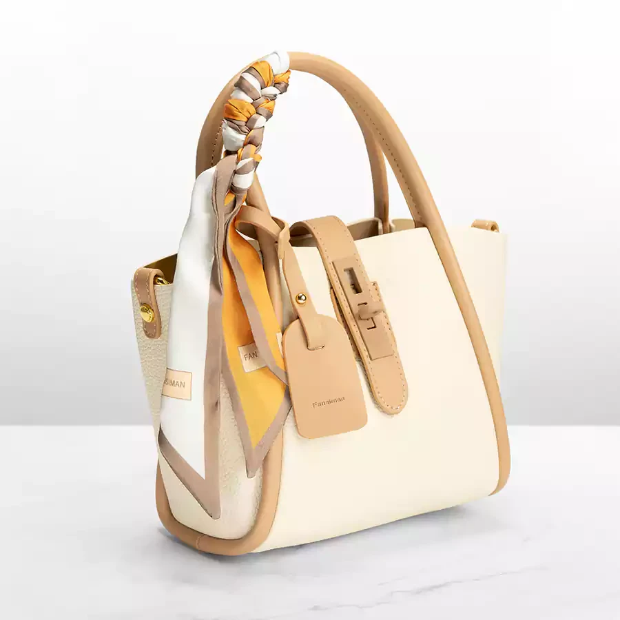 Casual bag beige color with zipper and lock + ribbon in leather